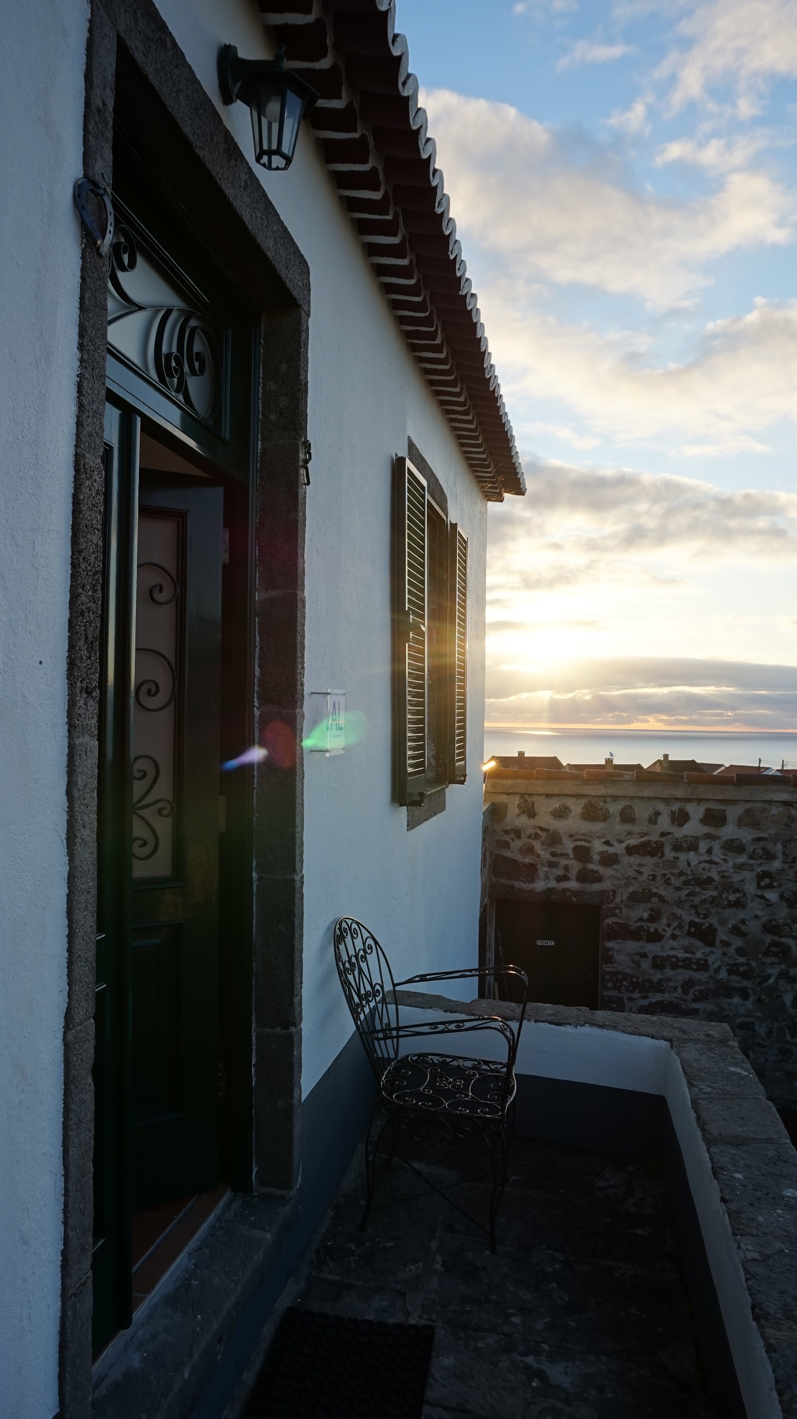 Traditional entry detail with stone and cottage-style finishes